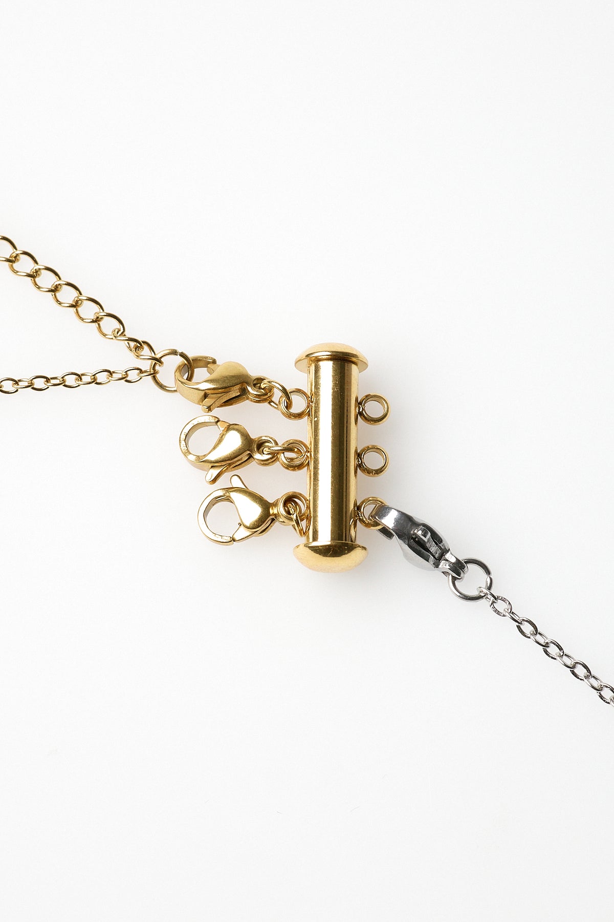 Broche triple colliers